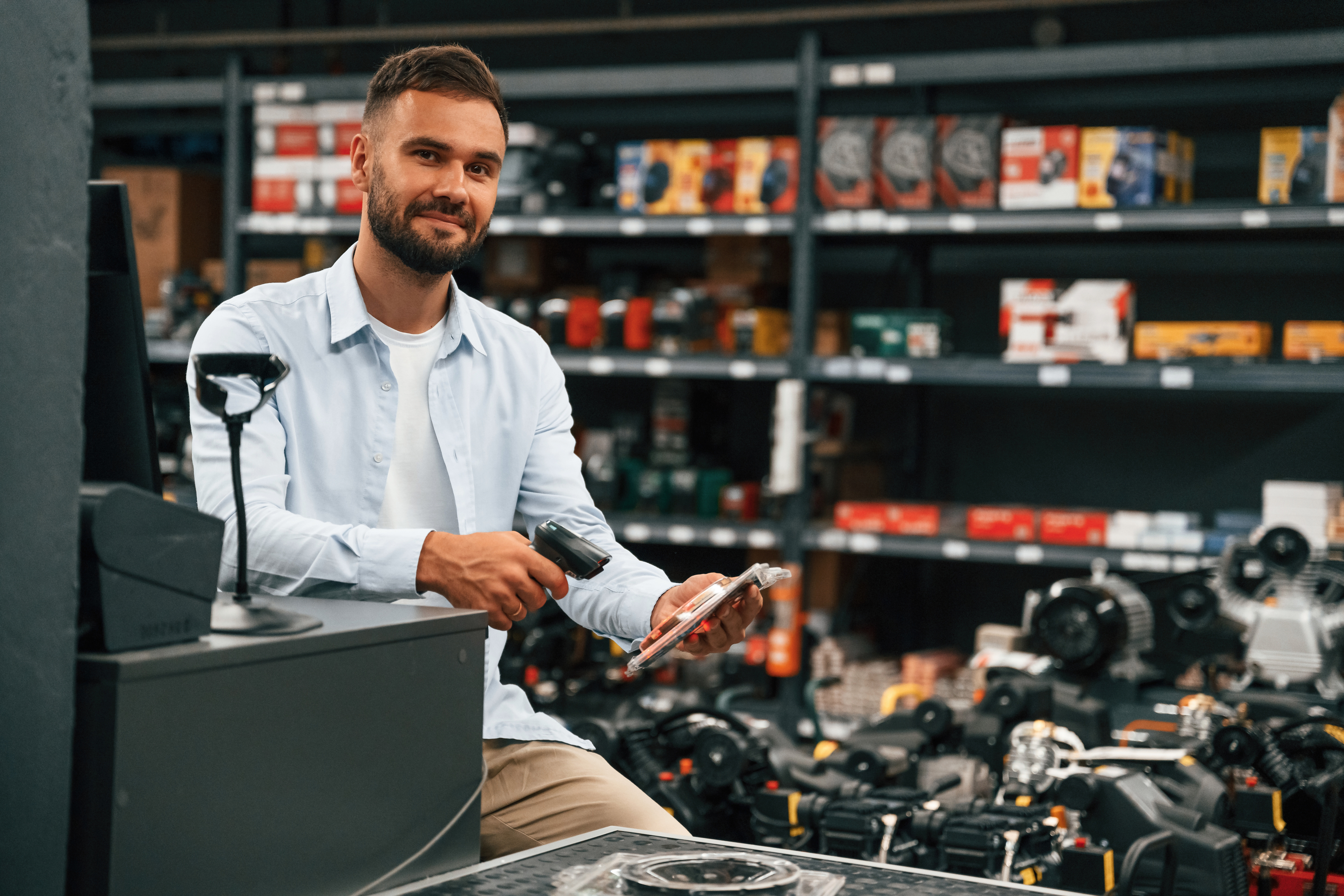 cashier-is-at-work-man-is-in-the-hardware-shop-2024-08-22-23-52-50-utc